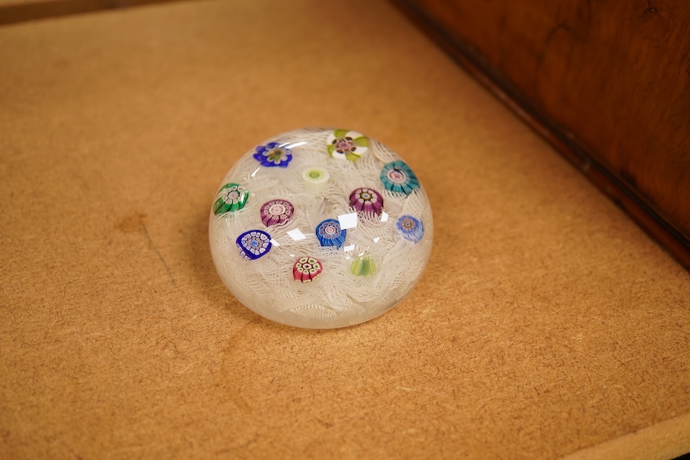 A Perthshire millefiori paperweight, 6.5cm in diameter, together with related Sotheby’s catalogues